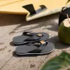 Black herringbone-shaped slippers, brown leather decoration, white brand label, black wavy rubber sole details Picture